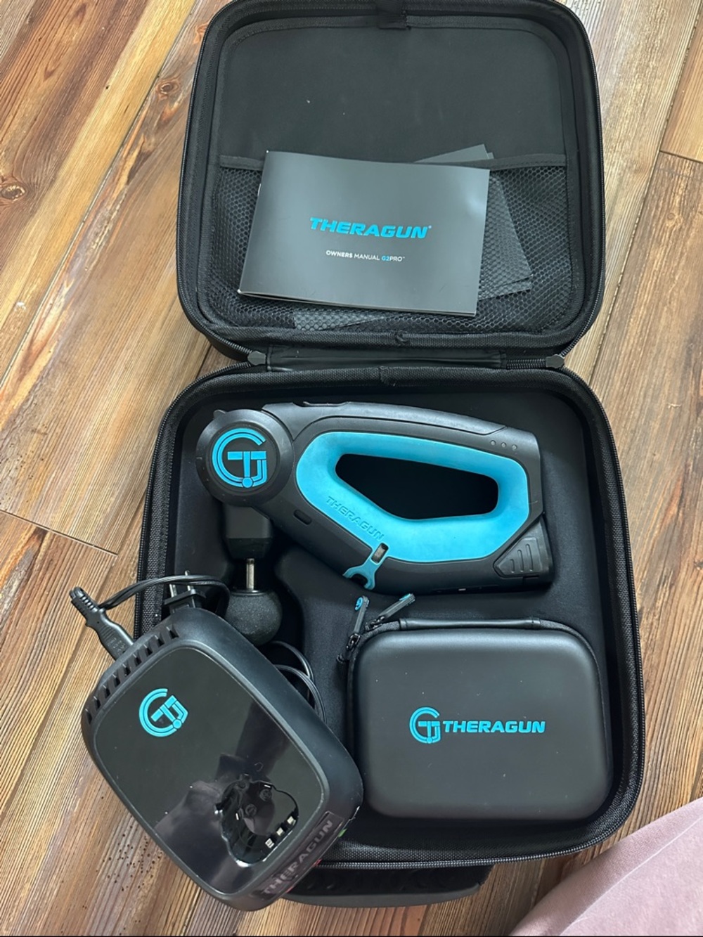 Theragun G2PRO Percussive Massage Gun in Black & Teal